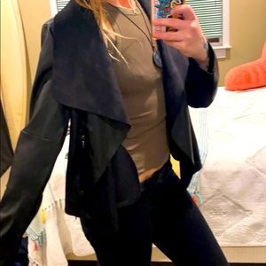 Leather looking two pocket flowing Jacket